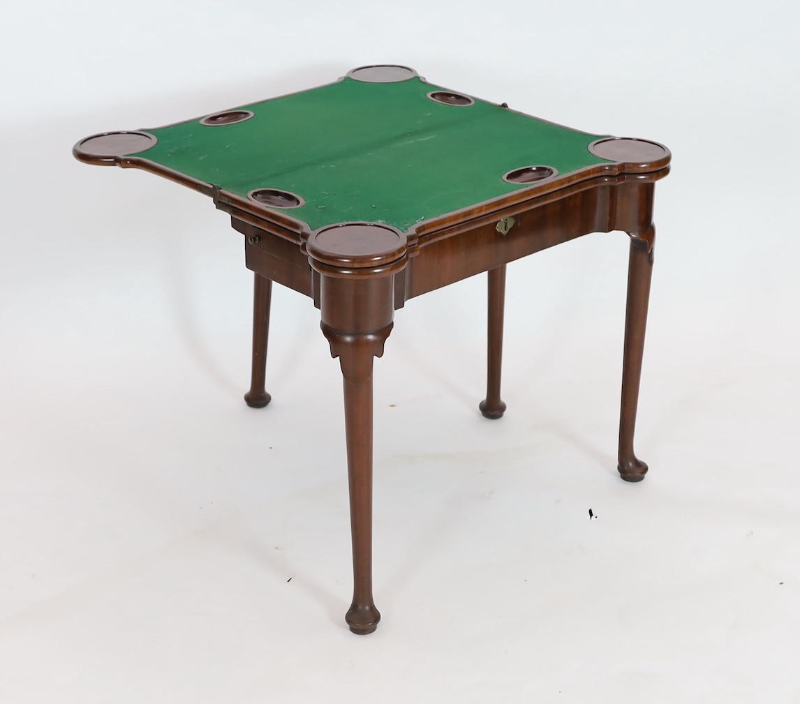 A George II mahogany games table, width 86cm, depth 43cm, height 74cm